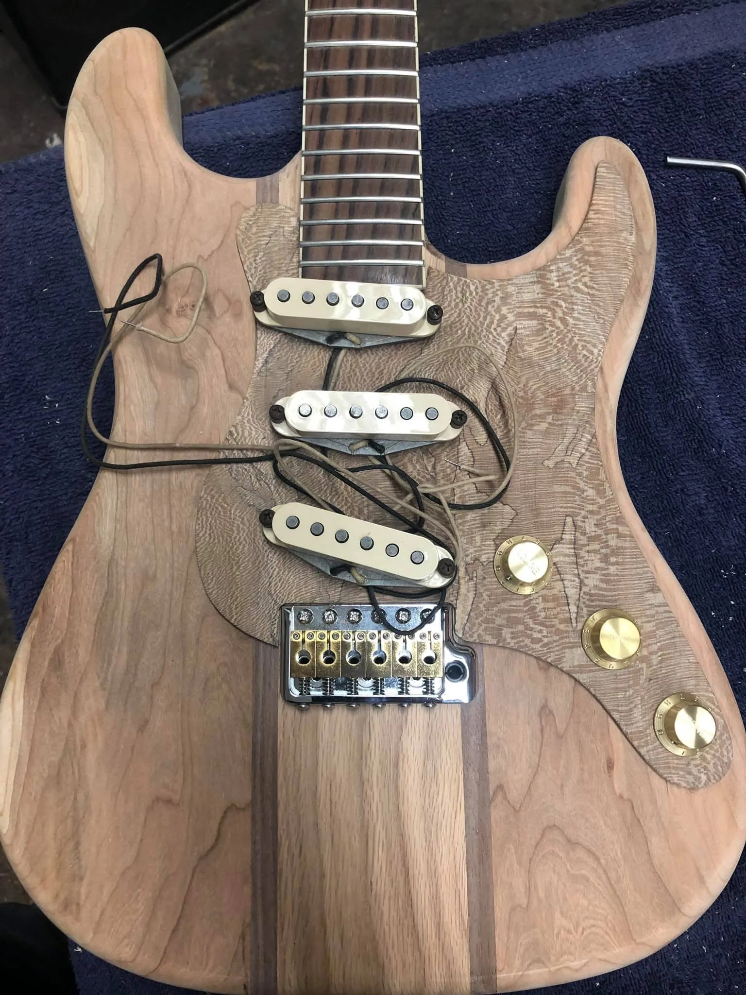 Boutique S-style guitar build in progress at a shop in Maryland — Seymour Duncan pickups, sunburst body