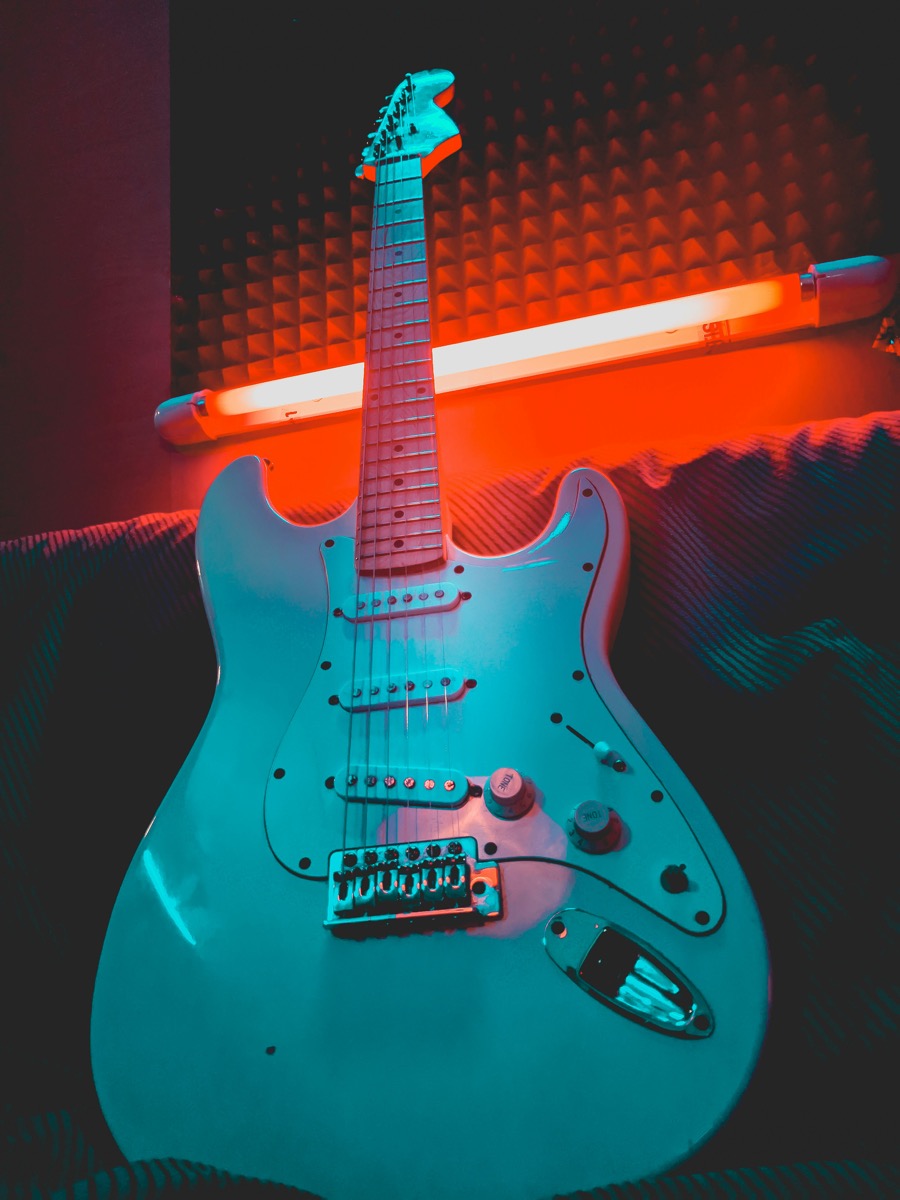 S-style guitar in a recording studio — the design Fender is now claiming copyright over