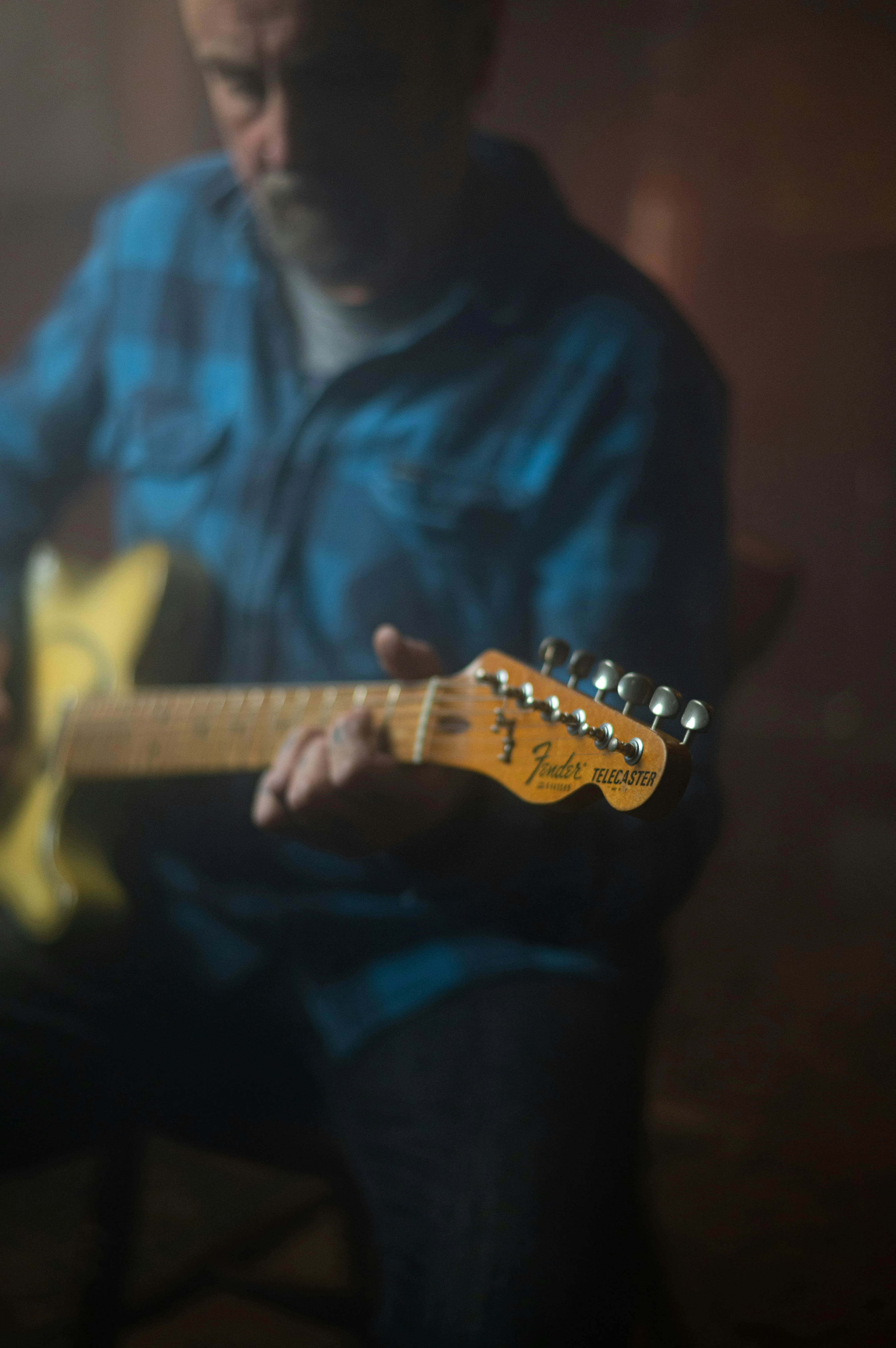Adult guitarist focused on playing — learning guitar later in life